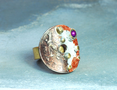 white bronze coin ring