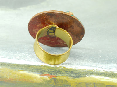 red oxidized coin ring