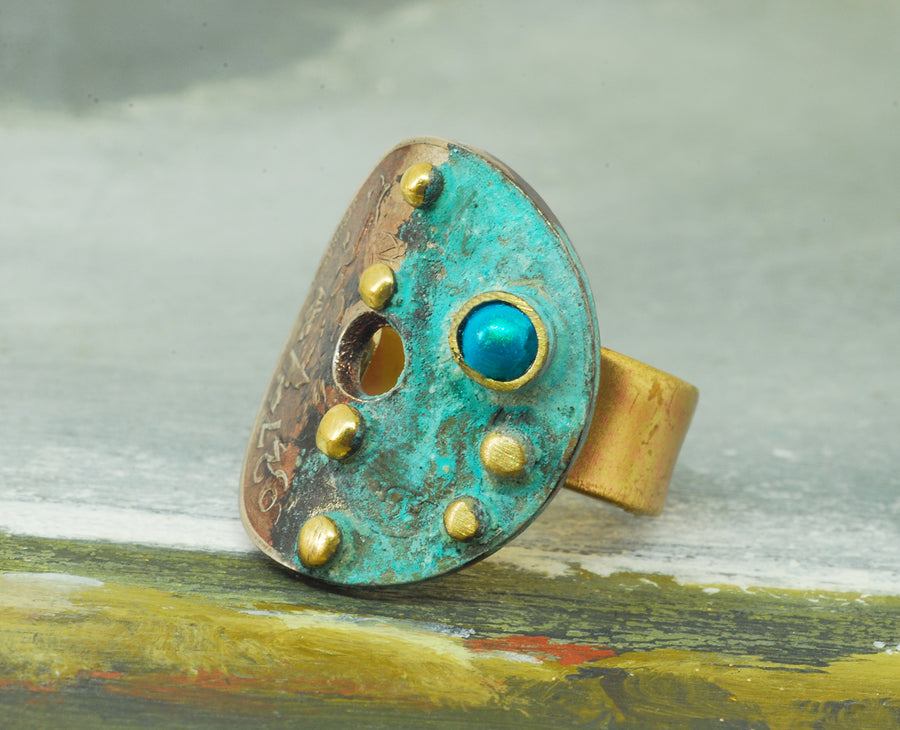 light blue oxidized coin ring